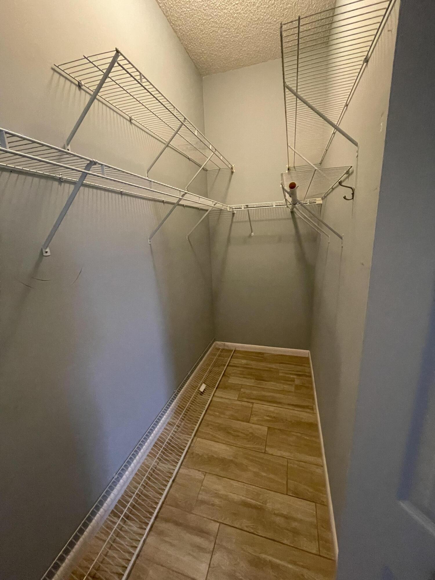 500 Southwest Aster Road Port St. Lucie, FL 34953 - Photo 25 of 36 500 SW Aster Rd walk-in closet