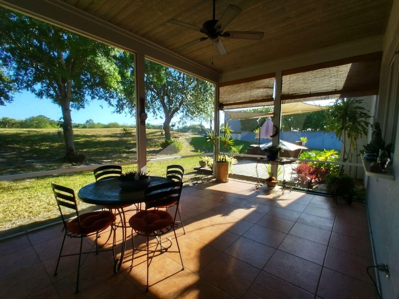 500 Southwest Aster Road Port St. Lucie, FL 34953 - Photo 26 of 36 500 SW Aster Rd Patio 1