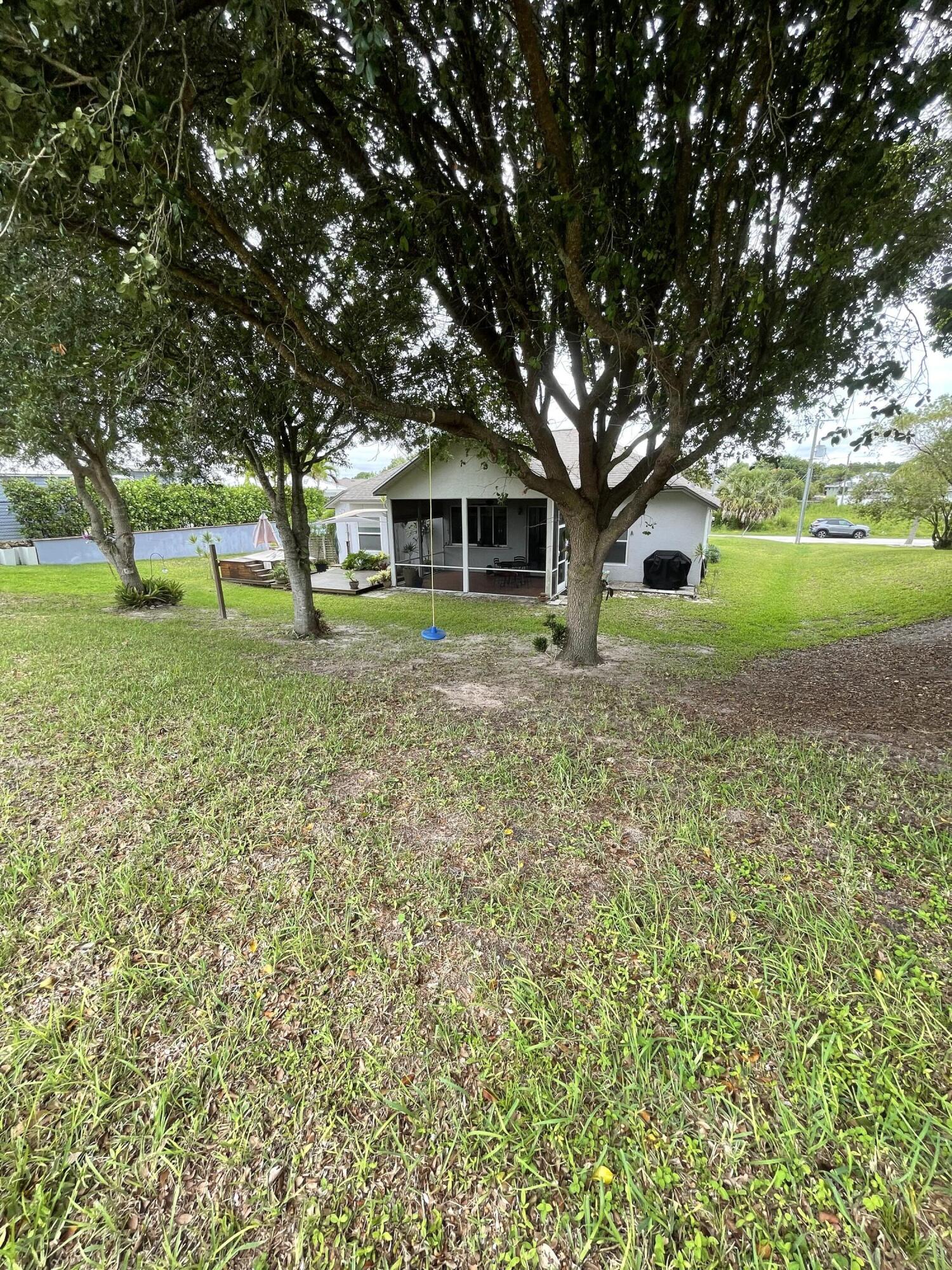 500 Southwest Aster Road Port St. Lucie, FL 34953 - Photo 31 of 36 500 SW Aster Rd Backyard 3