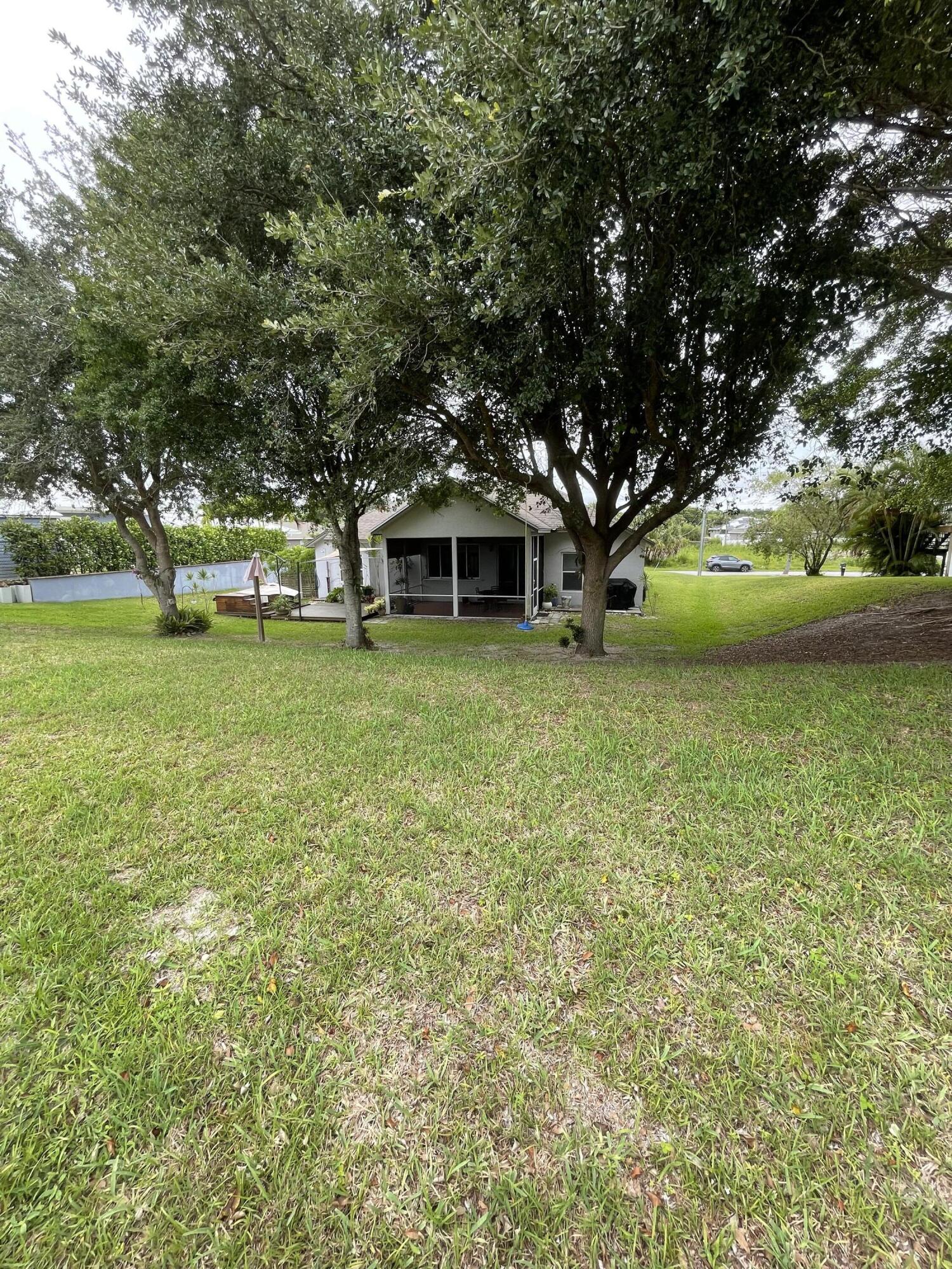 500 Southwest Aster Road Port St. Lucie, FL 34953 - Photo 36 of 36 500 SW Aster Rd Backyard 2