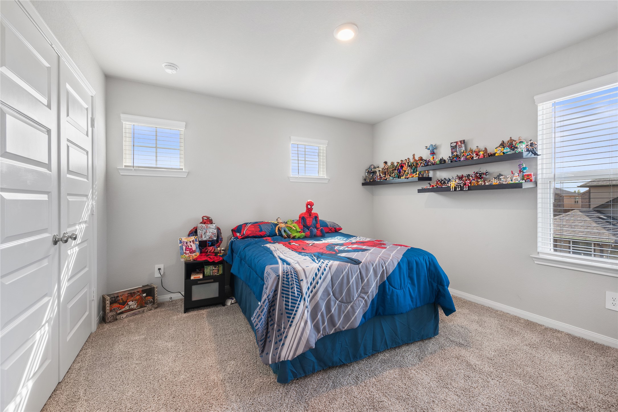 1203 Cascade Hls Drive Rosharon, TX 77583 - Photo 11 of 25 a bedroom with bed and a window