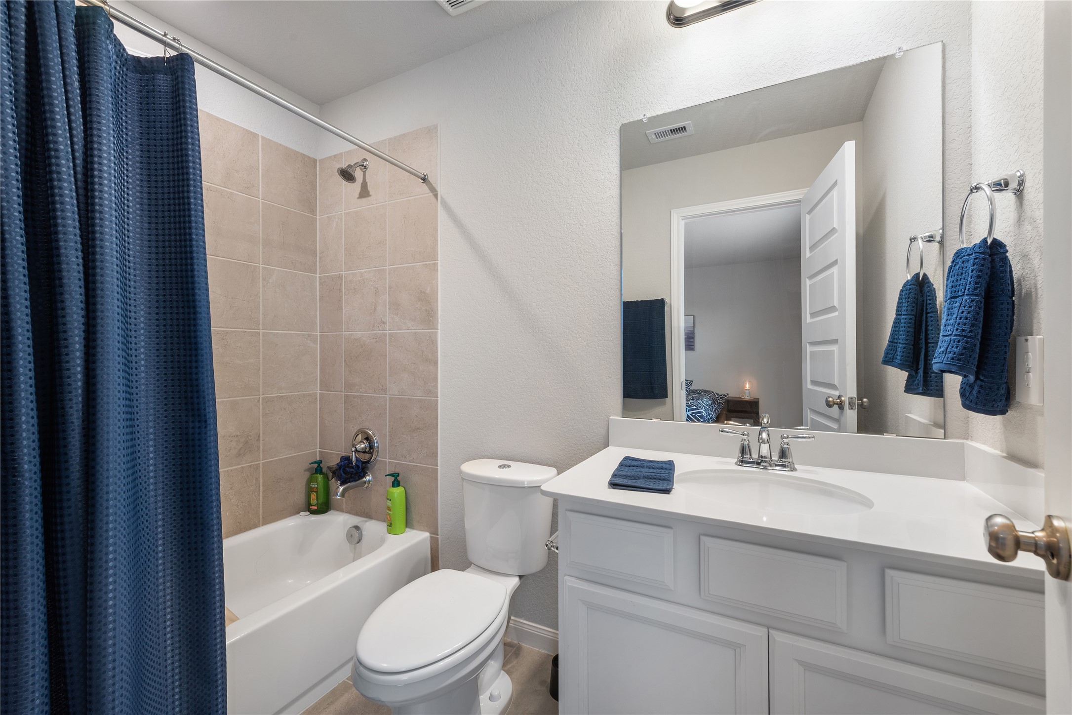 1203 Cascade Hls Drive Rosharon, TX 77583 - Photo 13 of 25 a bathroom with a sink mirror vanity and toilet