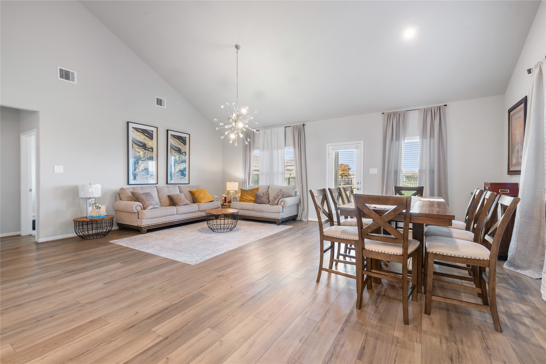 1203 Cascade Hls Drive Rosharon, TX 77583 - Photo 3 of 25 a living room with furniture and a chandelier