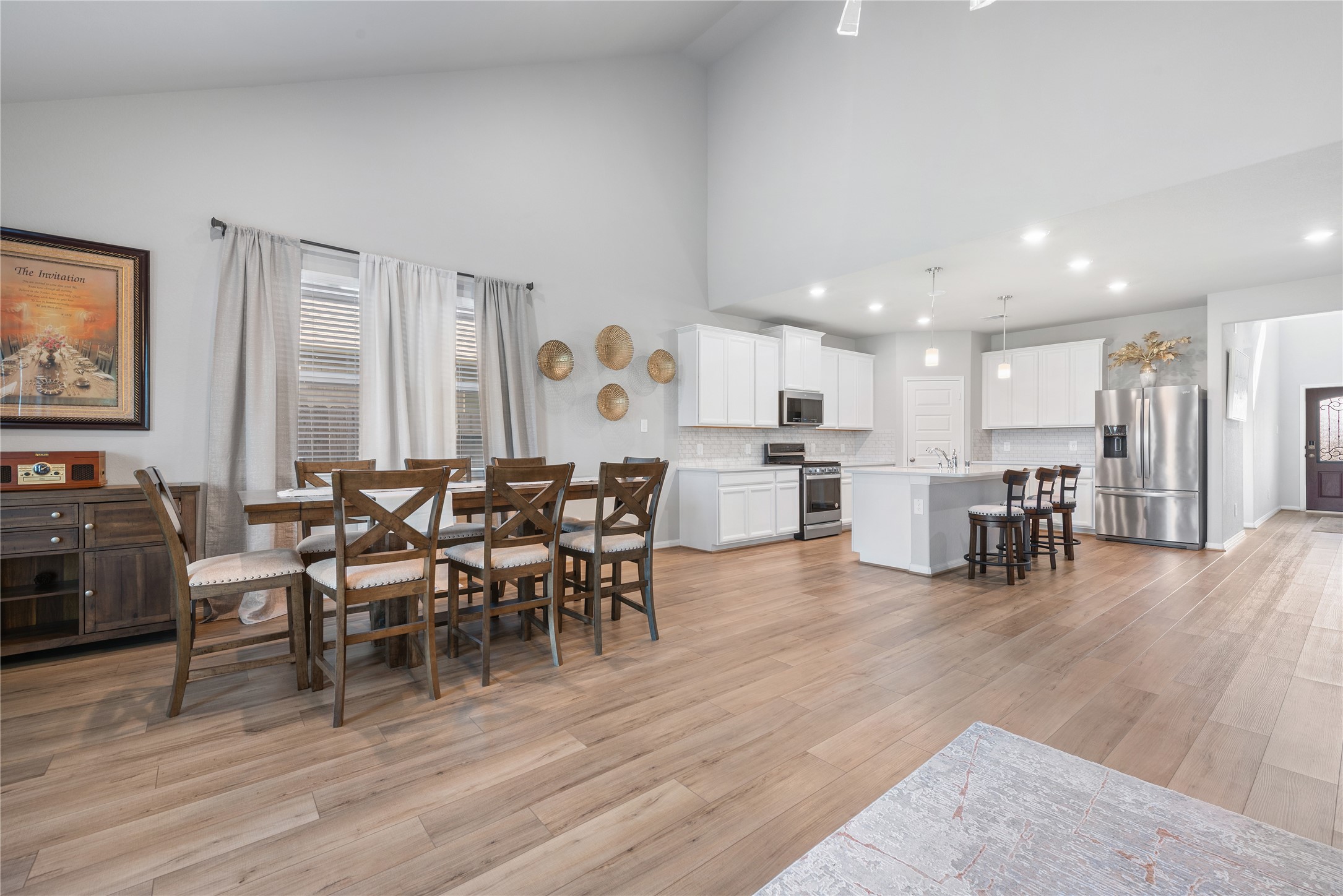 1203 Cascade Hls Drive Rosharon, TX 77583 - Photo 5 of 25 a view of a dining room with furniture and wooden floor