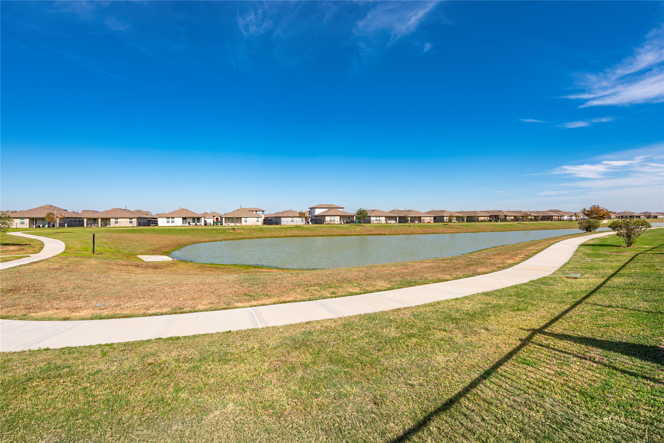 1203 Cascade Hls Drive Rosharon, TX 77583 - Photo 6 of 25 a view of a swimming pool and an ocean