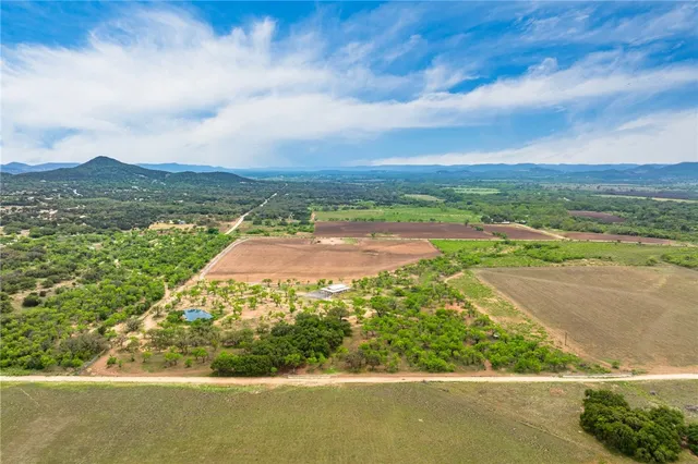 a view of lake with a yard