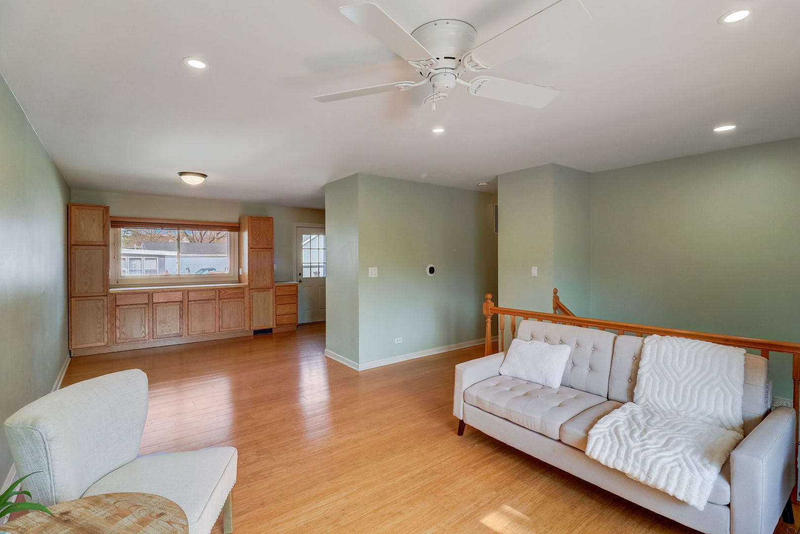 560 Willow Road Wauconda, IL 60084 - Photo 4 of 24 a living room with furniture and a couch