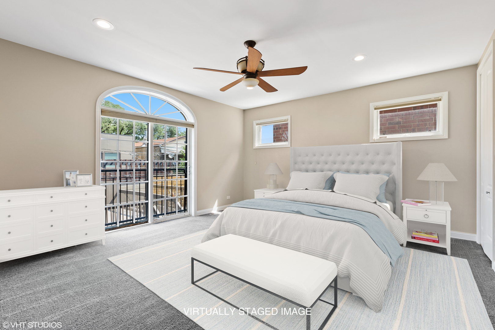 2038 West Race Avenue Chicago, IL 60612 - Photo 13 of 35 a bedroom with a bed chandelier and a window