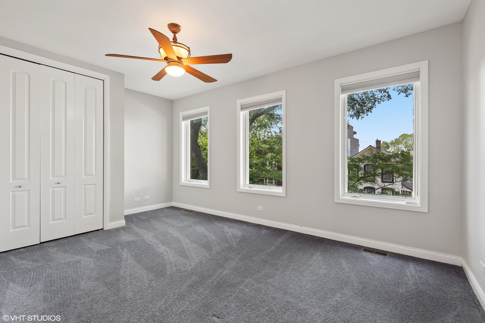 2038 West Race Avenue Chicago, IL 60612 - Photo 17 of 35 a view of a livingroom with a ceiling fan and window