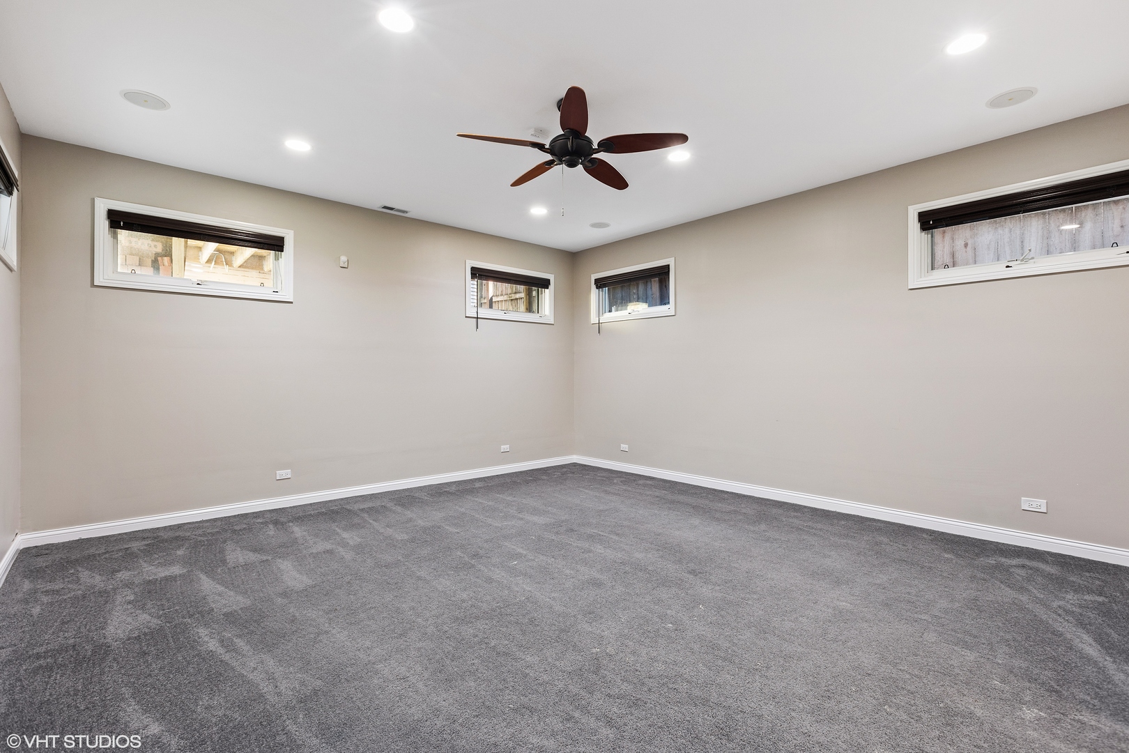 2038 West Race Avenue Chicago, IL 60612 - Photo 20 of 35 an empty room with a ceiling fan and window