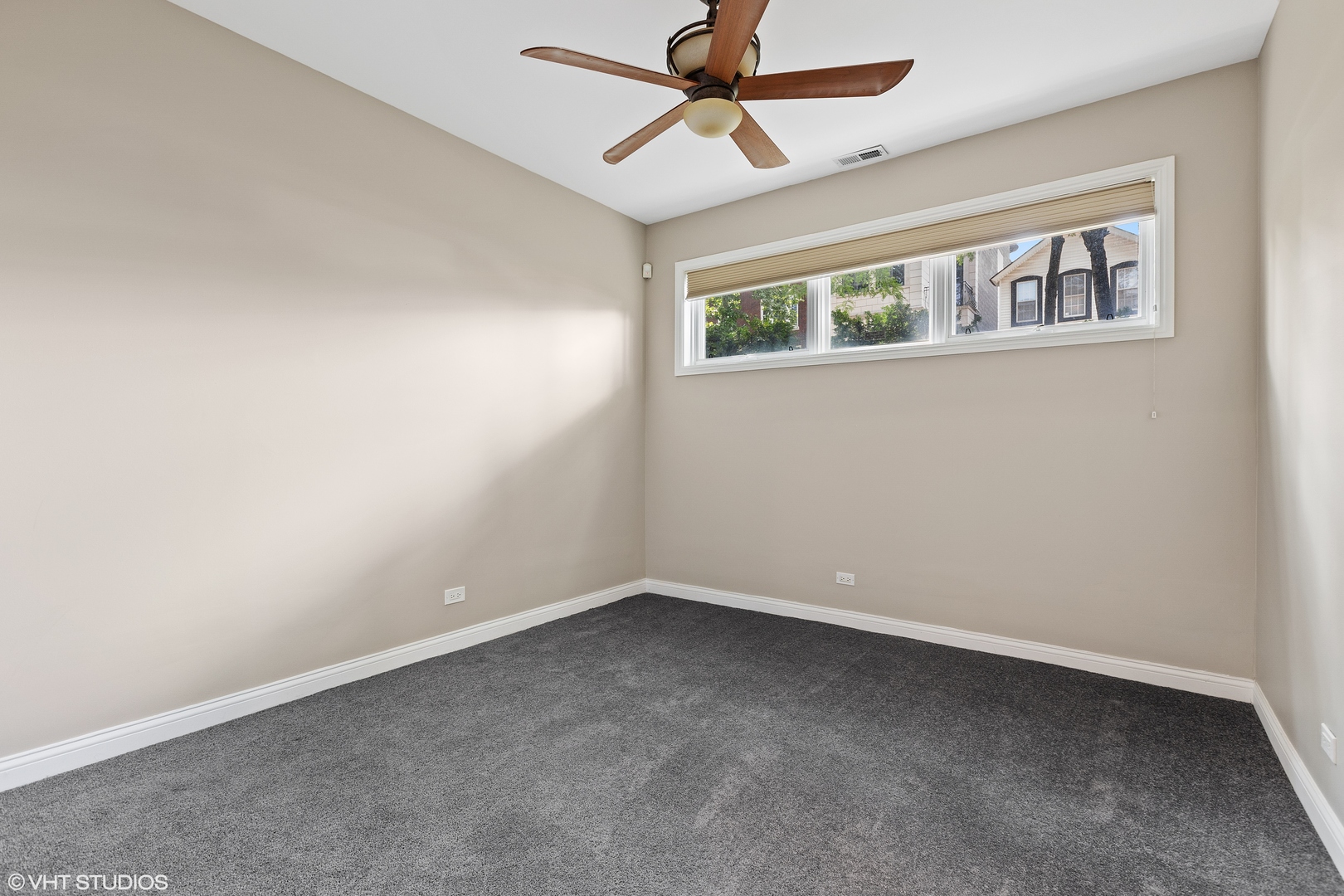 2038 West Race Avenue Chicago, IL 60612 - Photo 22 of 35 a view of an empty room with a window