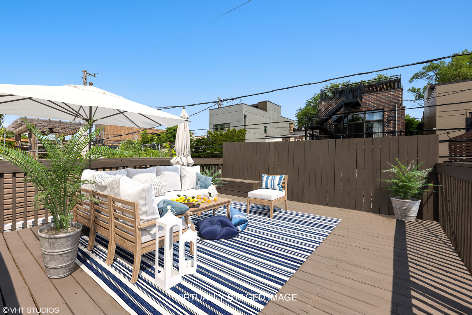 2038 West Race Avenue Chicago, IL 60612 - Photo 28 of 35 a view of a patio with wooden floor