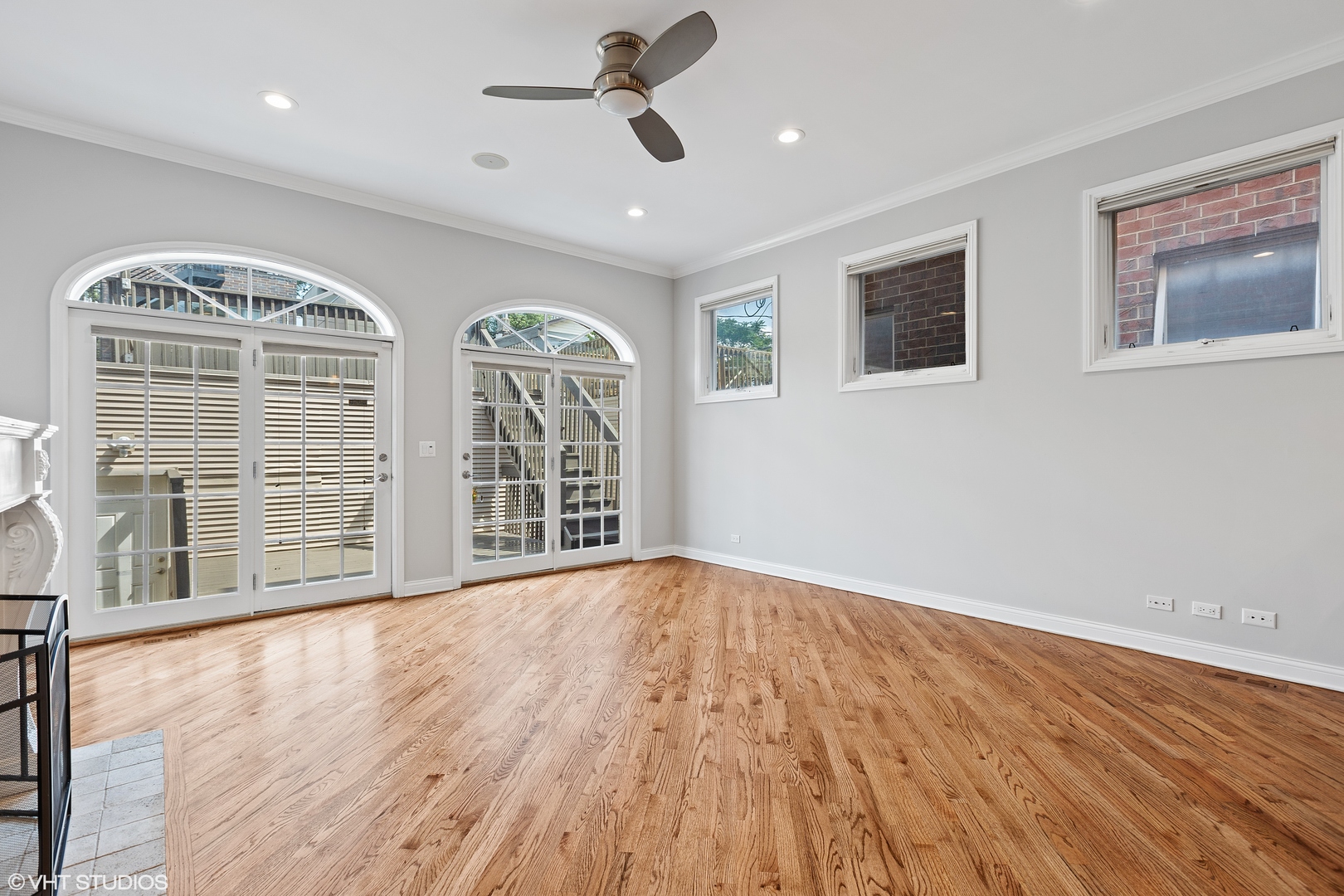 2038 West Race Avenue Chicago, IL 60612 - Photo 10 of 35 a view of an empty room with wooden floor and windows