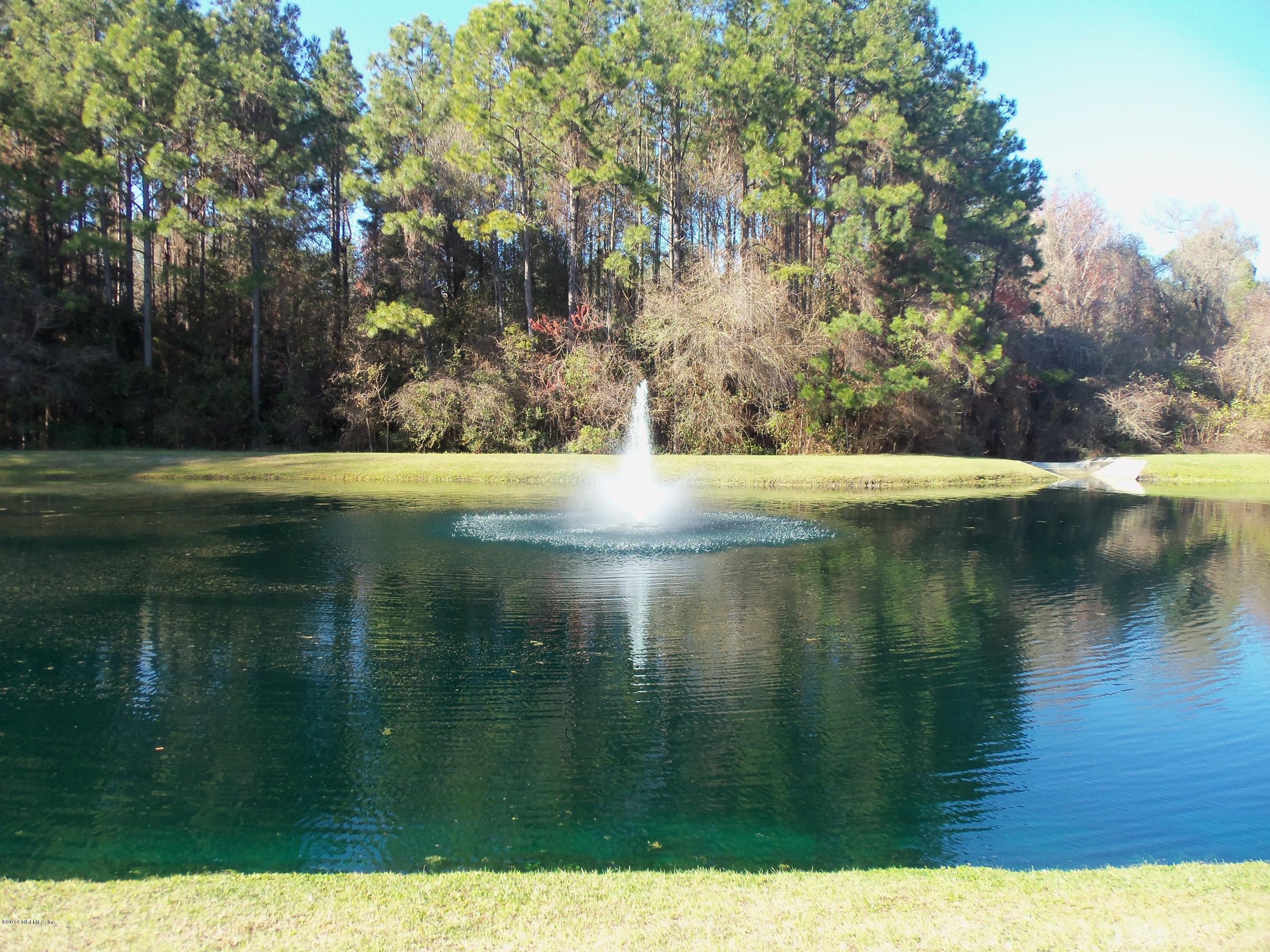 9732 Chirping Way Jacksonville, FL 32222 - Photo 27 of 27 a view of a lake