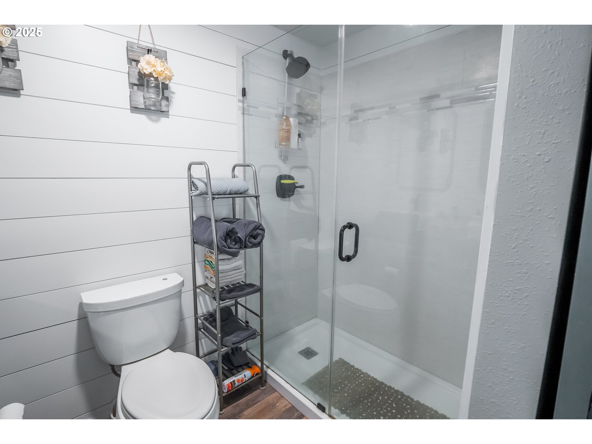 732 53rd Street Springfield, OR 97478 - Photo 15 of 27 a bathroom with a toilet and a shower