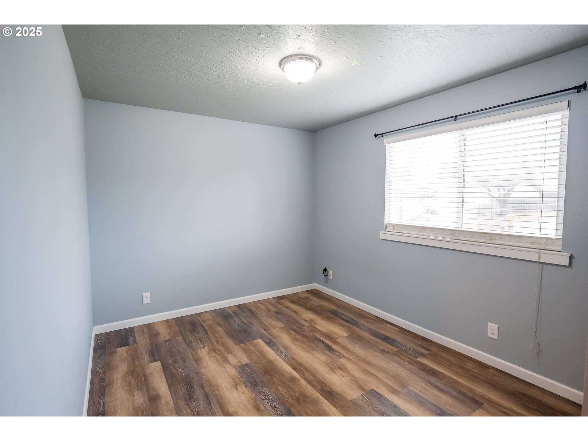 732 53rd Street Springfield, OR 97478 - Photo 18 of 27 a view of an empty room with a window