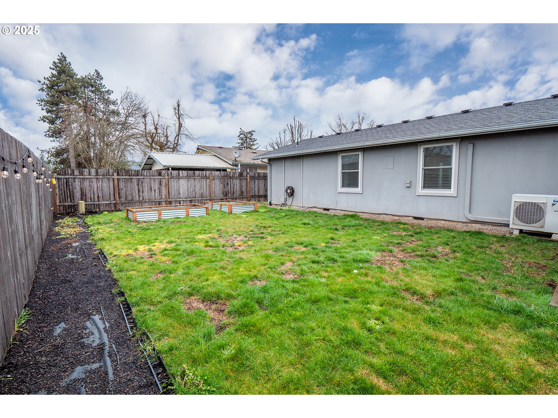 732 53rd Street Springfield, OR 97478 - Photo 27 of 27 a backyard of a house with lots of green space