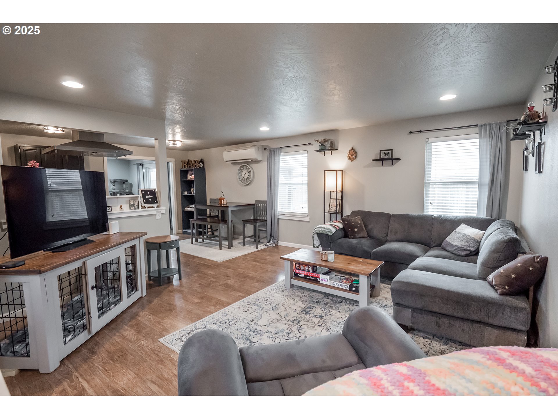 732 53rd Street Springfield, OR 97478 - Photo 4 of 27 a living room with furniture and a flat screen tv