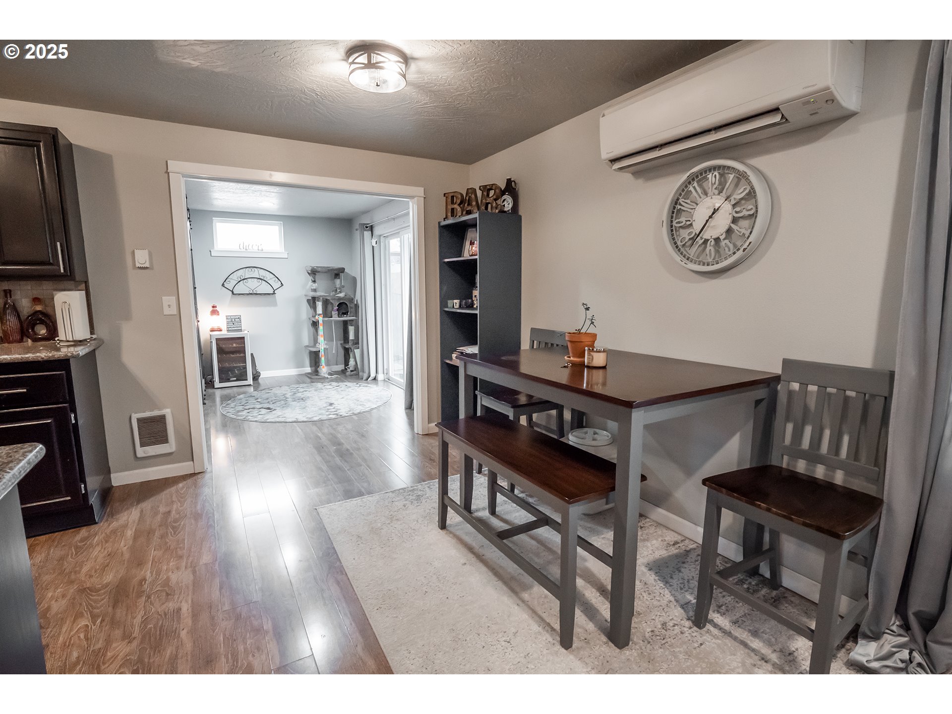 732 53rd Street Springfield, OR 97478 - Photo 7 of 27 a living room with furniture and a wooden floor