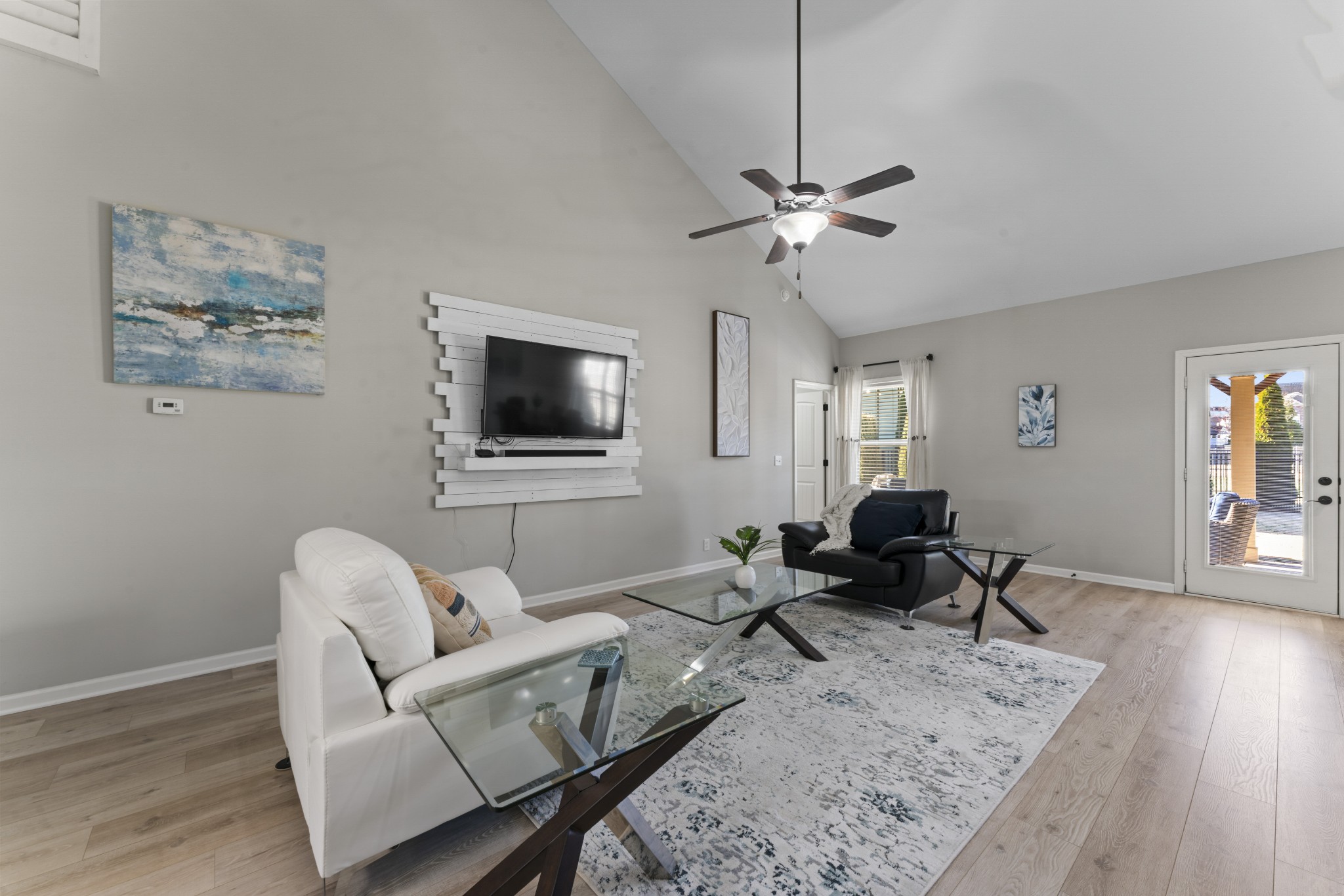 4425 Maximillion Circle Murfreesboro, TN 37128 - Photo 11 of 44 a living room with furniture a ceiling fan and a rug