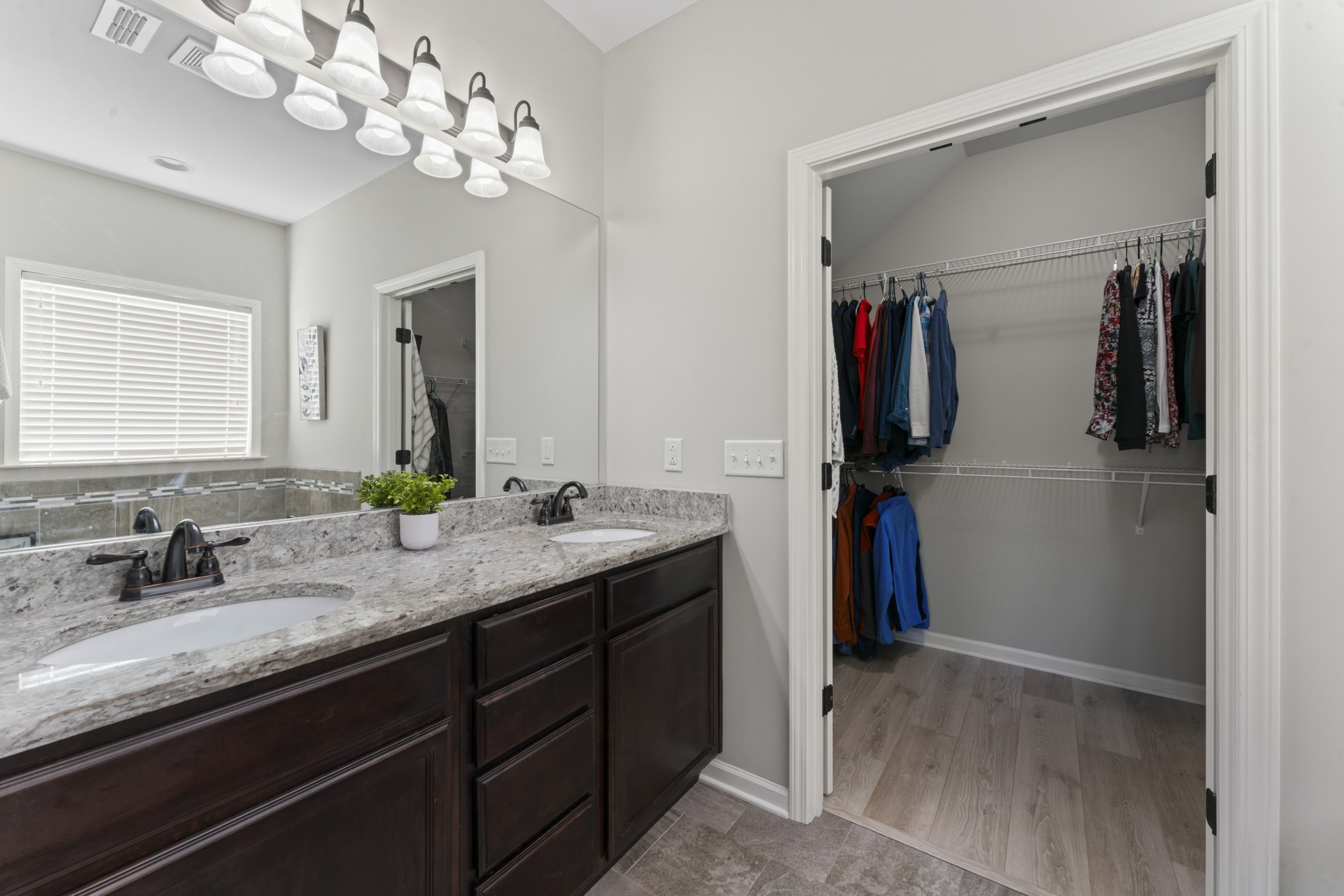 4425 Maximillion Circle Murfreesboro, TN 37128 - Photo 19 of 44 a bathroom with a sink vanity granite and a mirror