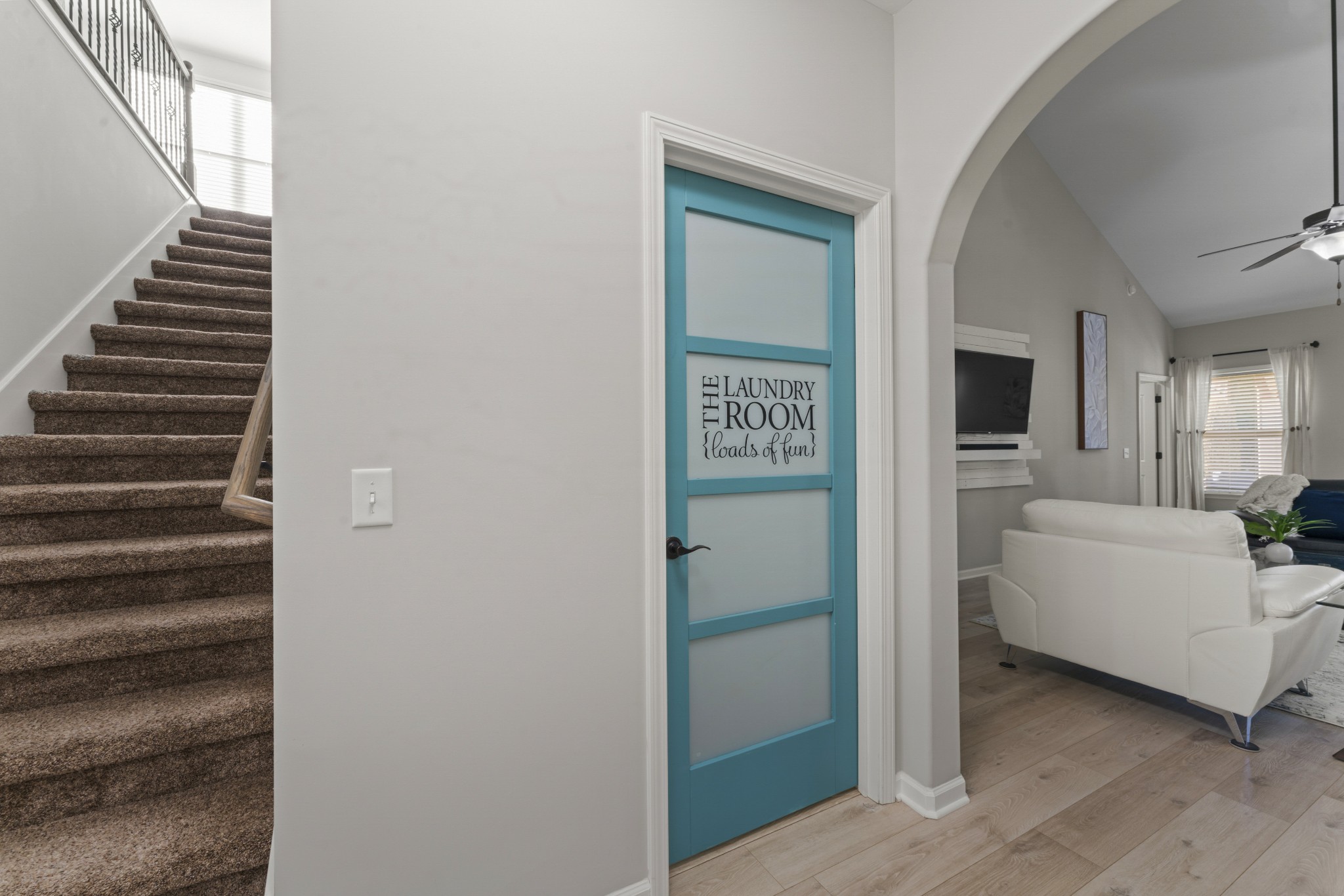 4425 Maximillion Circle Murfreesboro, TN 37128 - Photo 24 of 44 a view of a hallway to a livingroom with furniture and staircase