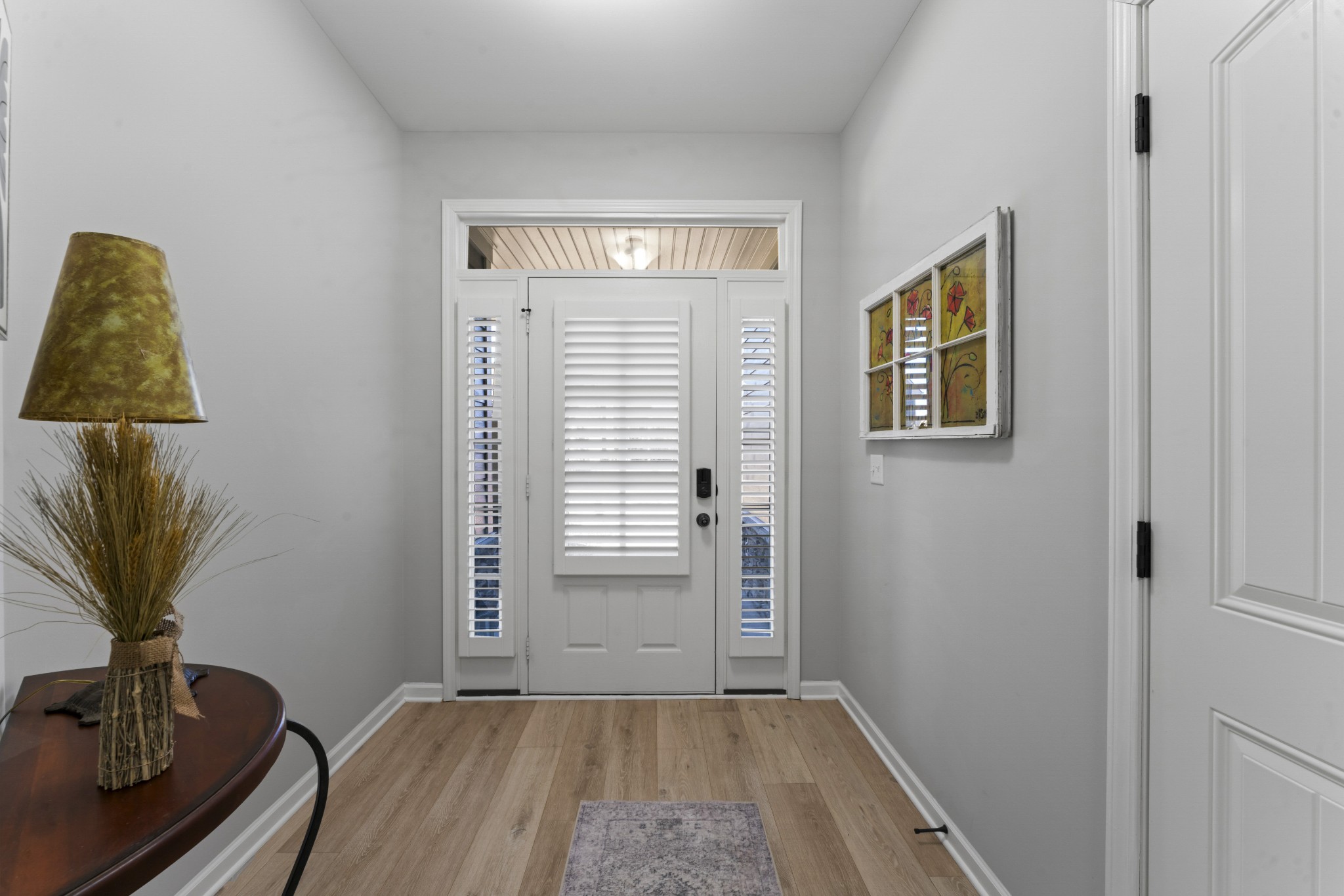 4425 Maximillion Circle Murfreesboro, TN 37128 - Photo 3 of 44 a view of livingroom with hardwood floor and a sink