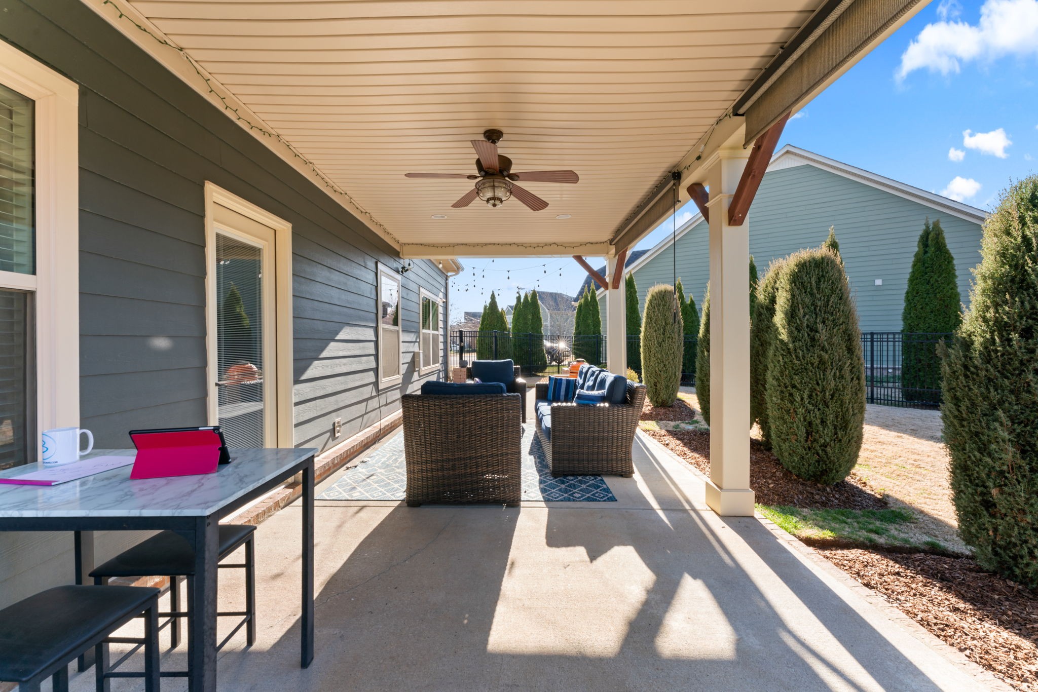4425 Maximillion Circle Murfreesboro, TN 37128 - Photo 35 of 44 a view of a porch with a dining table and chairs