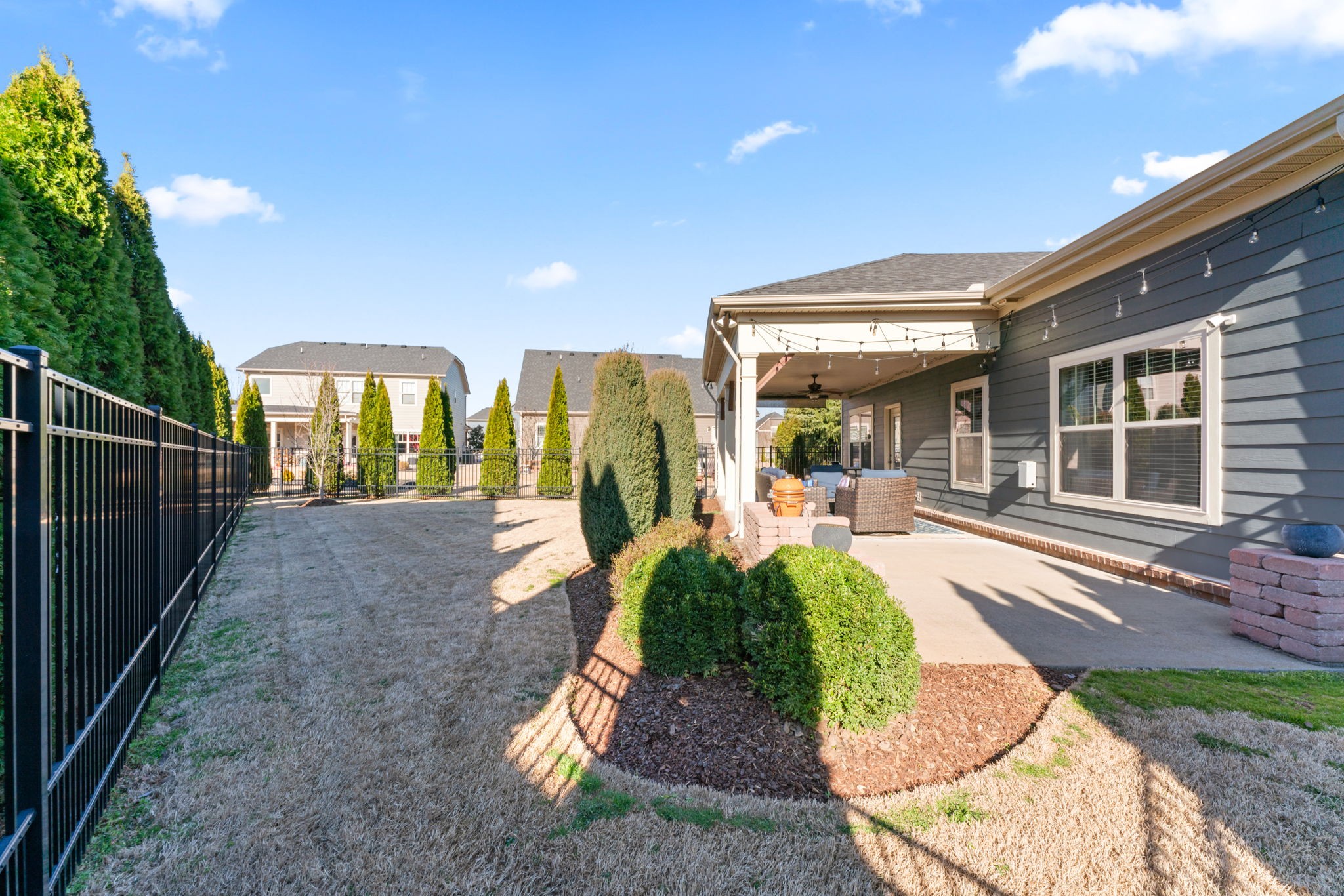 4425 Maximillion Circle Murfreesboro, TN 37128 - Photo 36 of 44 a view of a house with backyard porch and sitting area