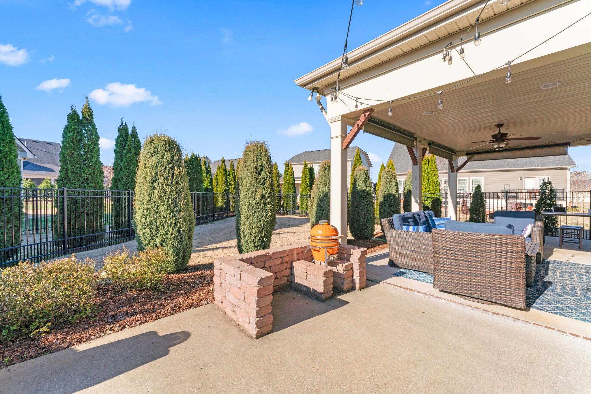 4425 Maximillion Circle Murfreesboro, TN 37128 - Photo 37 of 44 a view of a patio with couches table and chairs and potted plants