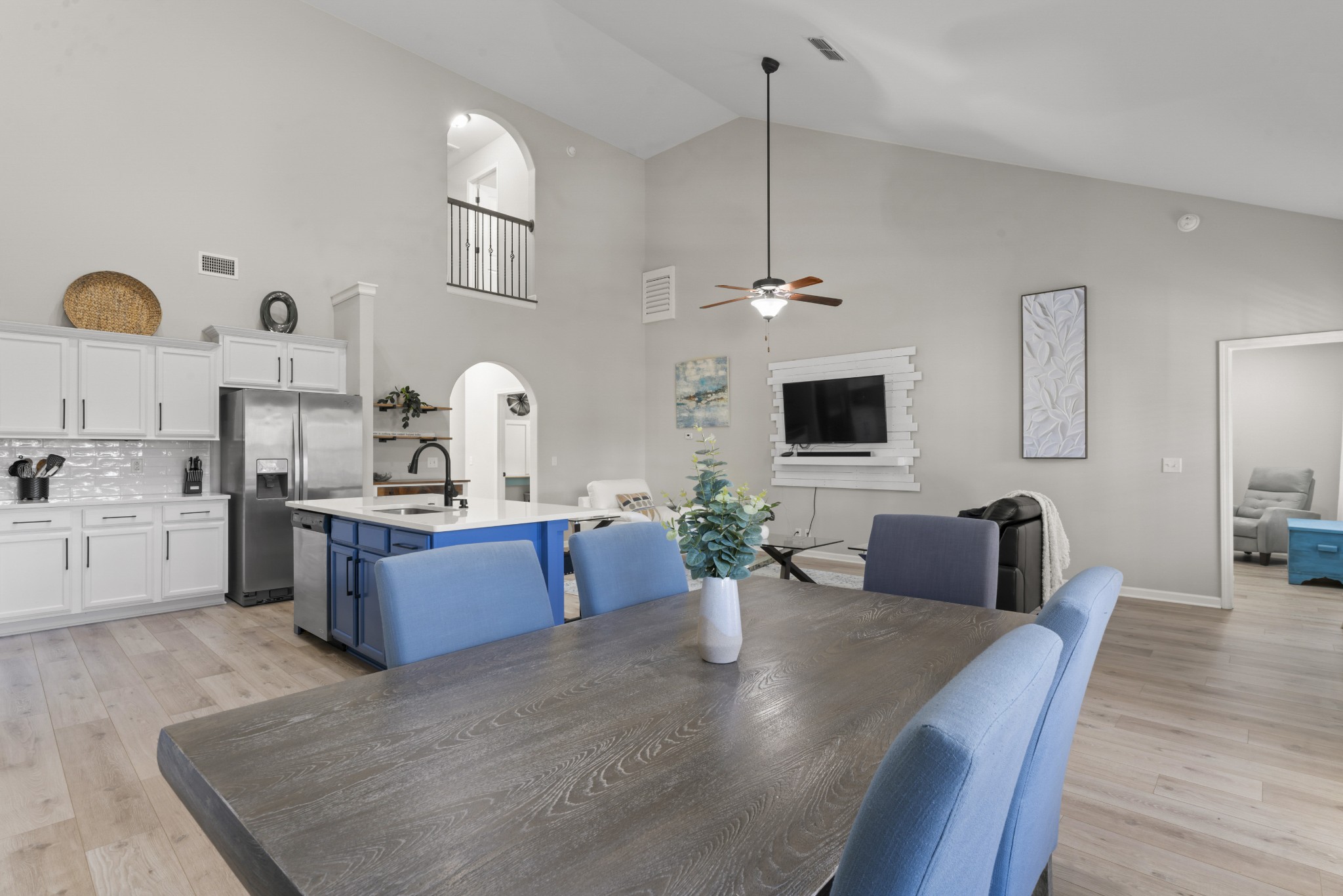 4425 Maximillion Circle Murfreesboro, TN 37128 - Photo 7 of 44 a living room with furniture flat screen tv and kitchen view