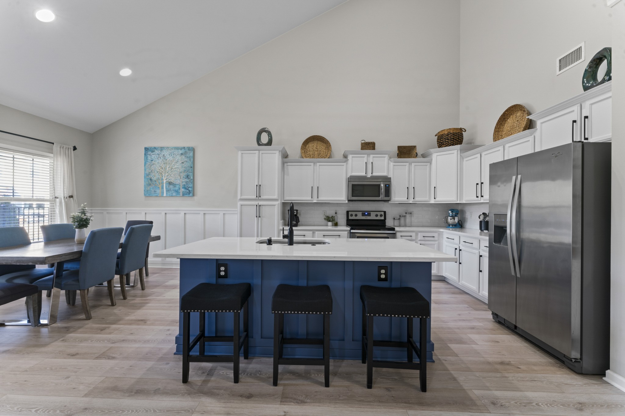 4425 Maximillion Circle Murfreesboro, TN 37128 - Photo 9 of 44 a kitchen with stainless steel appliances a table and chairs in it