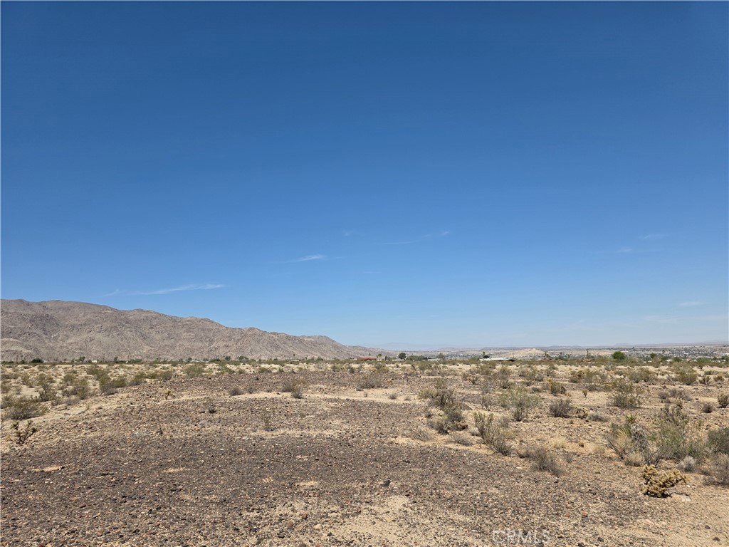 2 Baseline Road Twentynine Palms, CA 92277 - Photo 16 of 20 a view of a large building with a mountain in the background