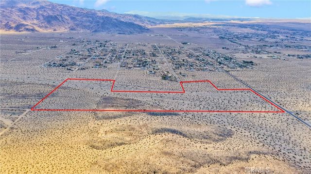 a view of a backyard of a house