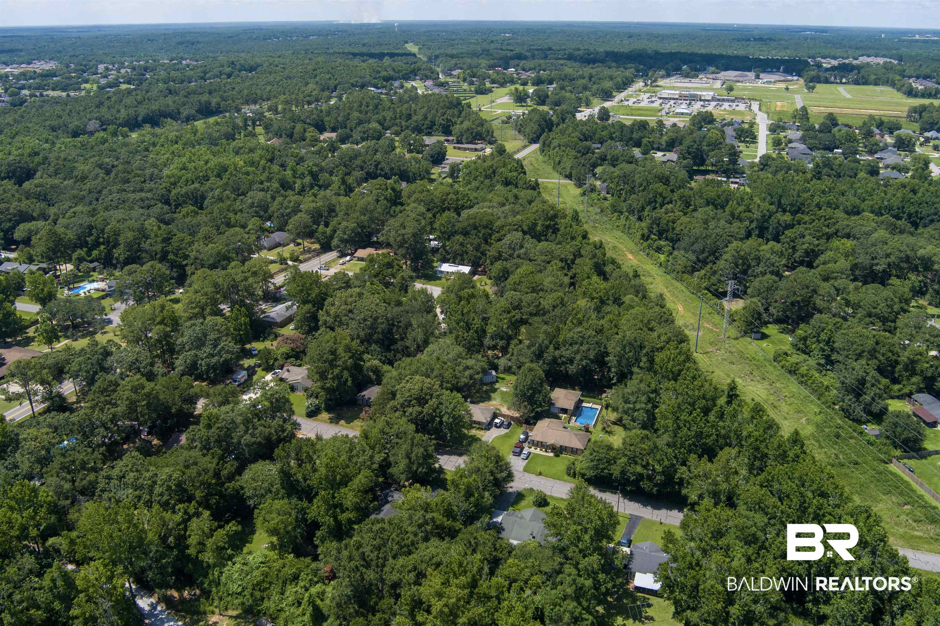 0 McFarland Road Mobile, AL 36695 - Photo 7 of 11 Aerial view of property's location featuring a forest