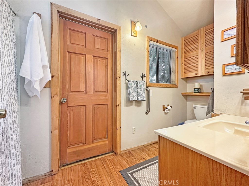 35 Sierra Buttes Road Sierra City, CA 96125 - Photo 14 of 37 a bedroom with a bed and a window