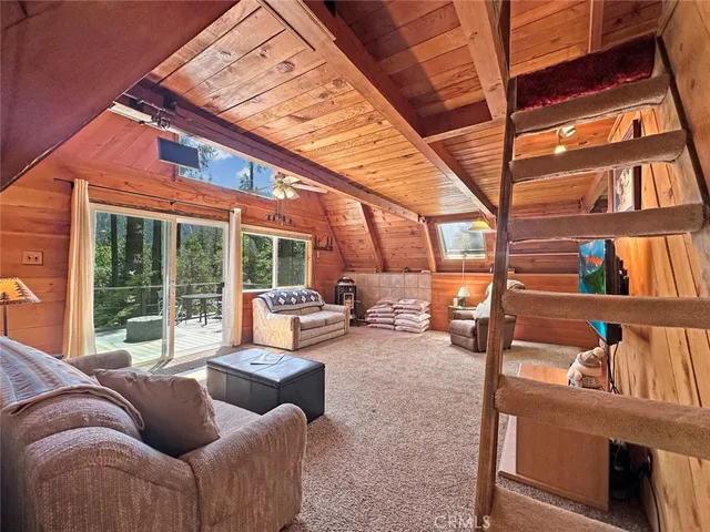 a large kitchen with stainless steel appliances granite countertop a stove a sink dishwasher and a refrigerator