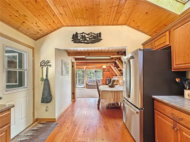 a dining room with a table and chairs
