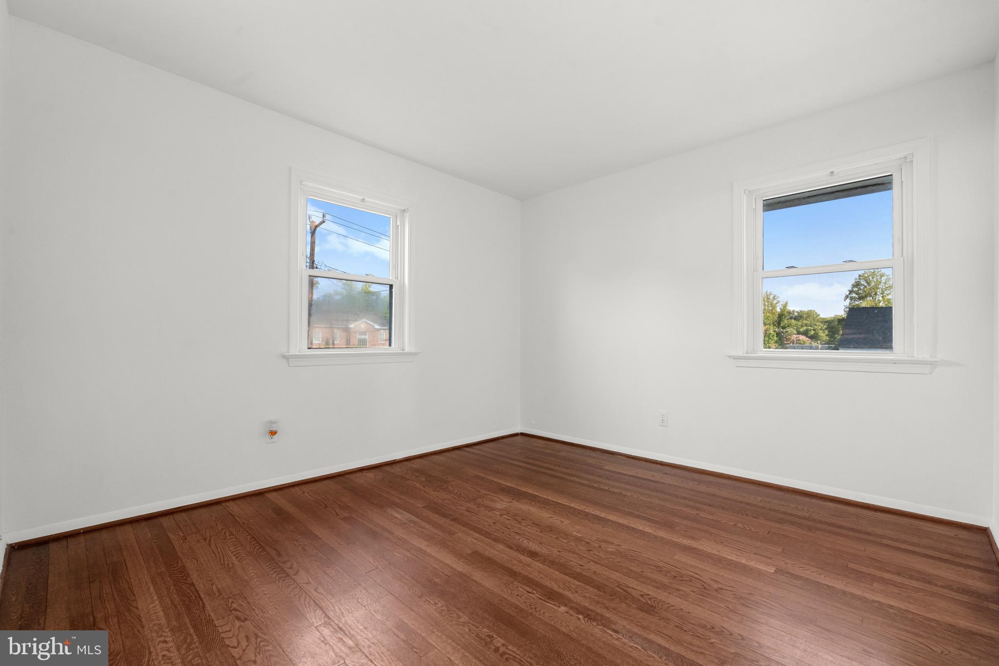 5505 Heming Avenue Springfield, VA 22151 - Photo 16 of 37 a view of empty room with wooden floor and fan