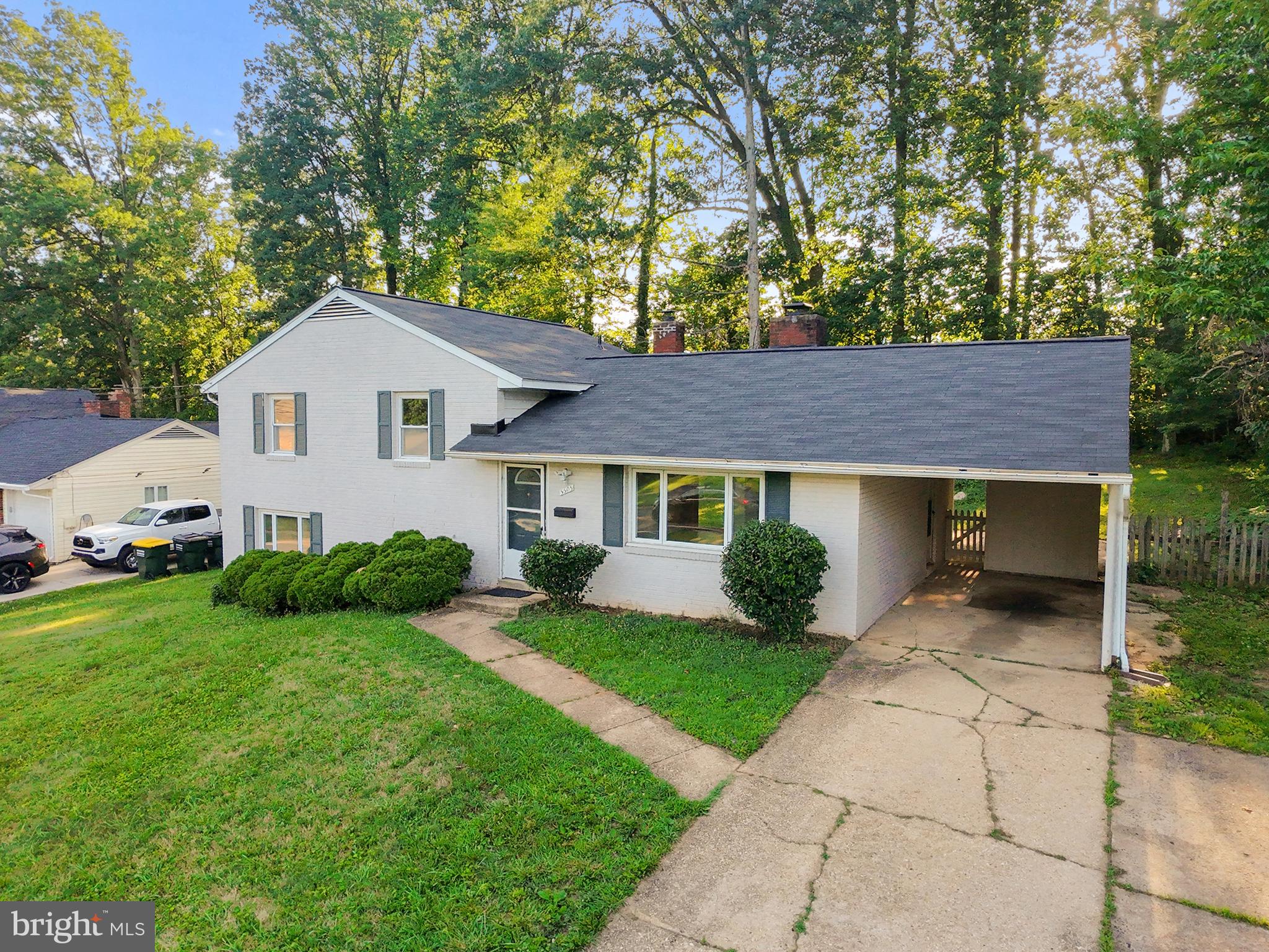 5505 Heming Avenue Springfield, VA 22151 - Photo 3 of 37 front view of a house and a yard