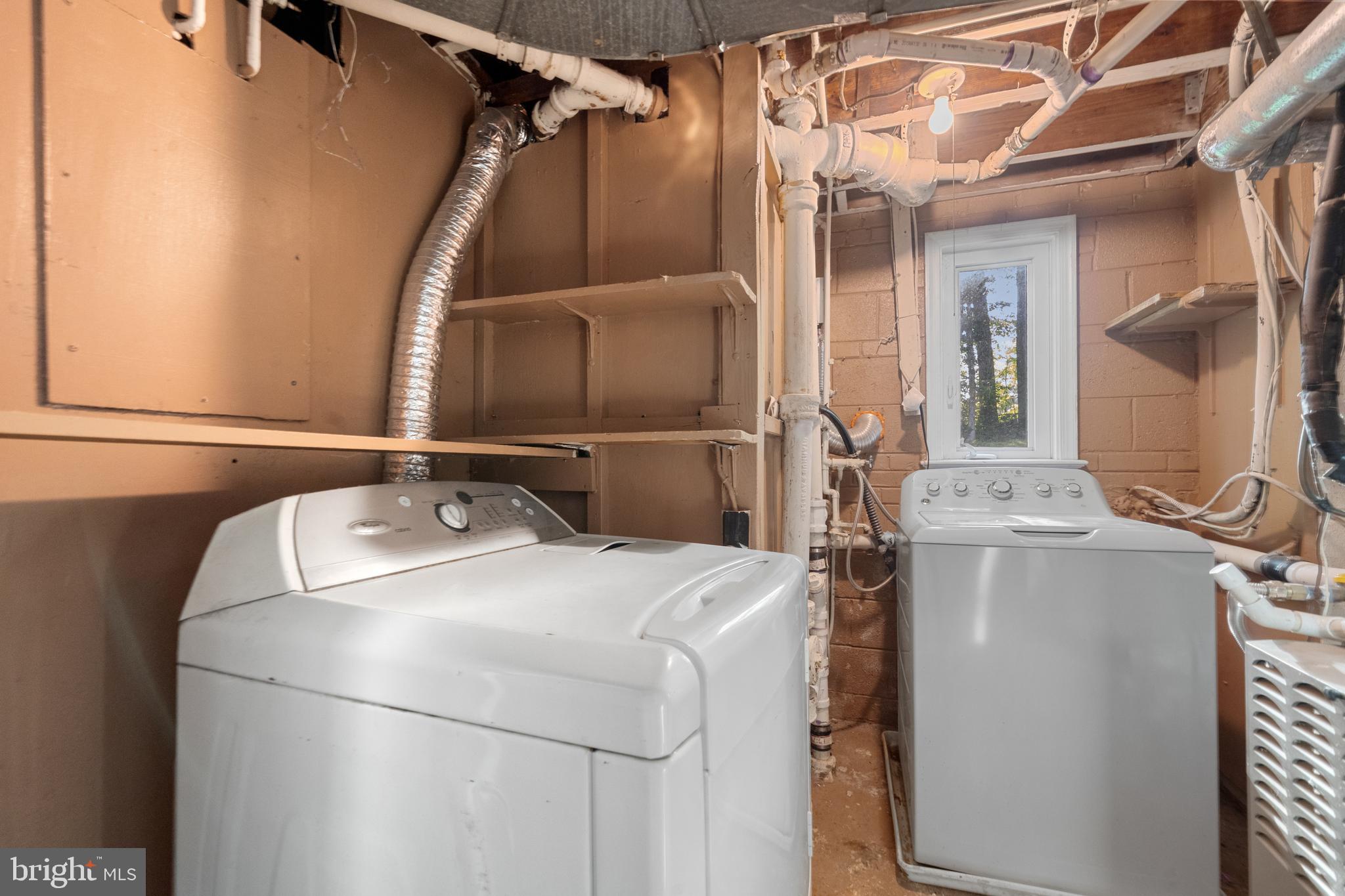 5505 Heming Avenue Springfield, VA 22151 - Photo 31 of 37 a utility room with dryer and washer