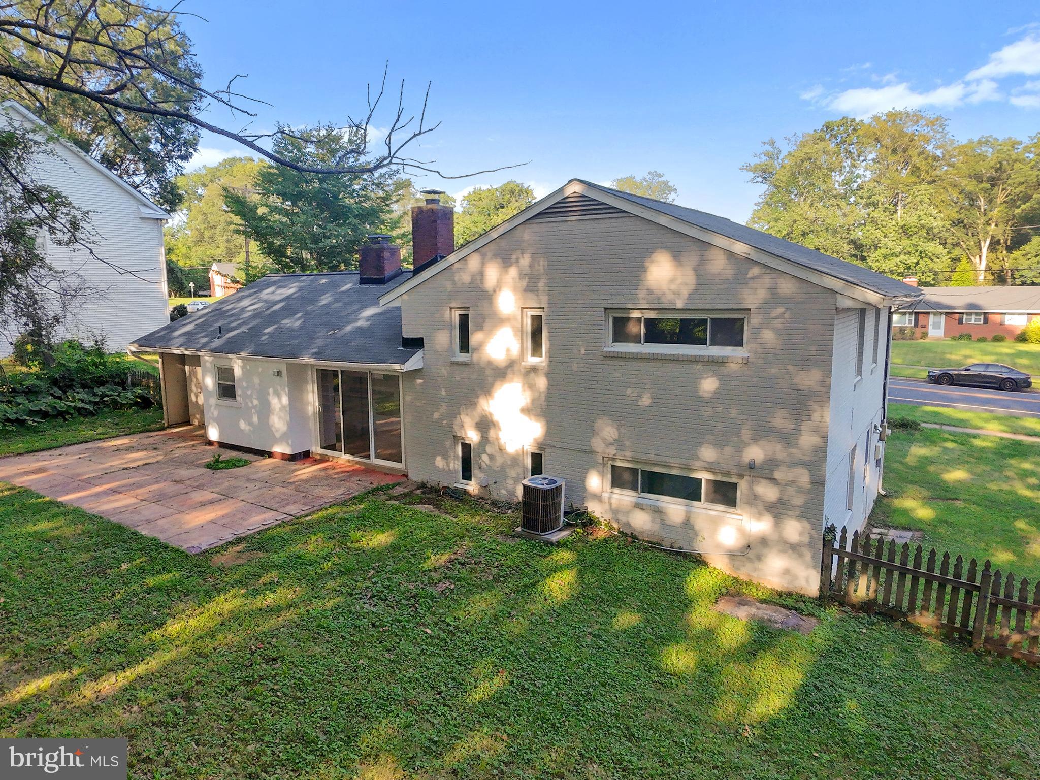 5505 Heming Avenue Springfield, VA 22151 - Photo 36 of 37 a front view of a house with a yard
