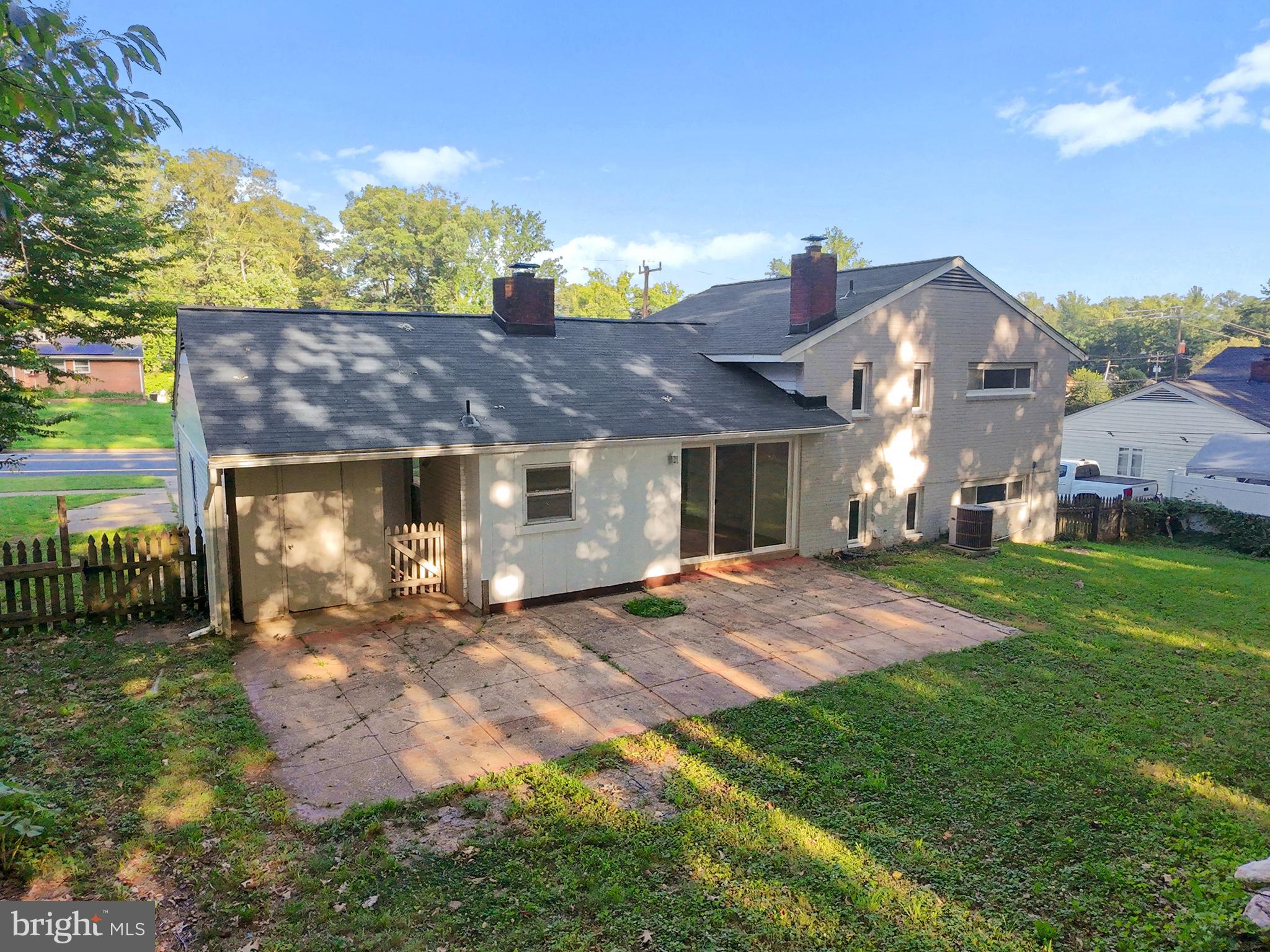 5505 Heming Avenue Springfield, VA 22151 - Photo 37 of 37 a front view of a house with a yard and garage
