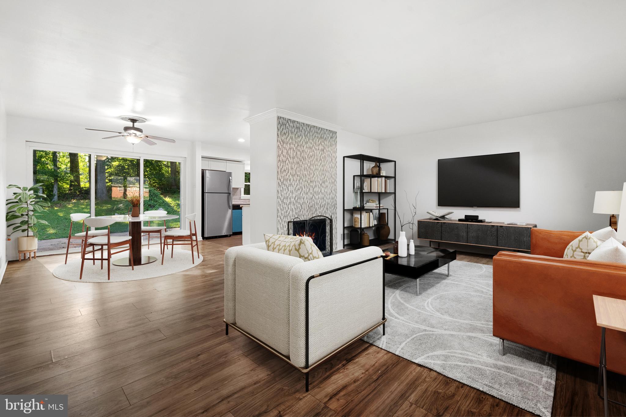 5505 Heming Avenue Springfield, VA 22151 - Photo 4 of 37 a living room with furniture and a flat screen tv
