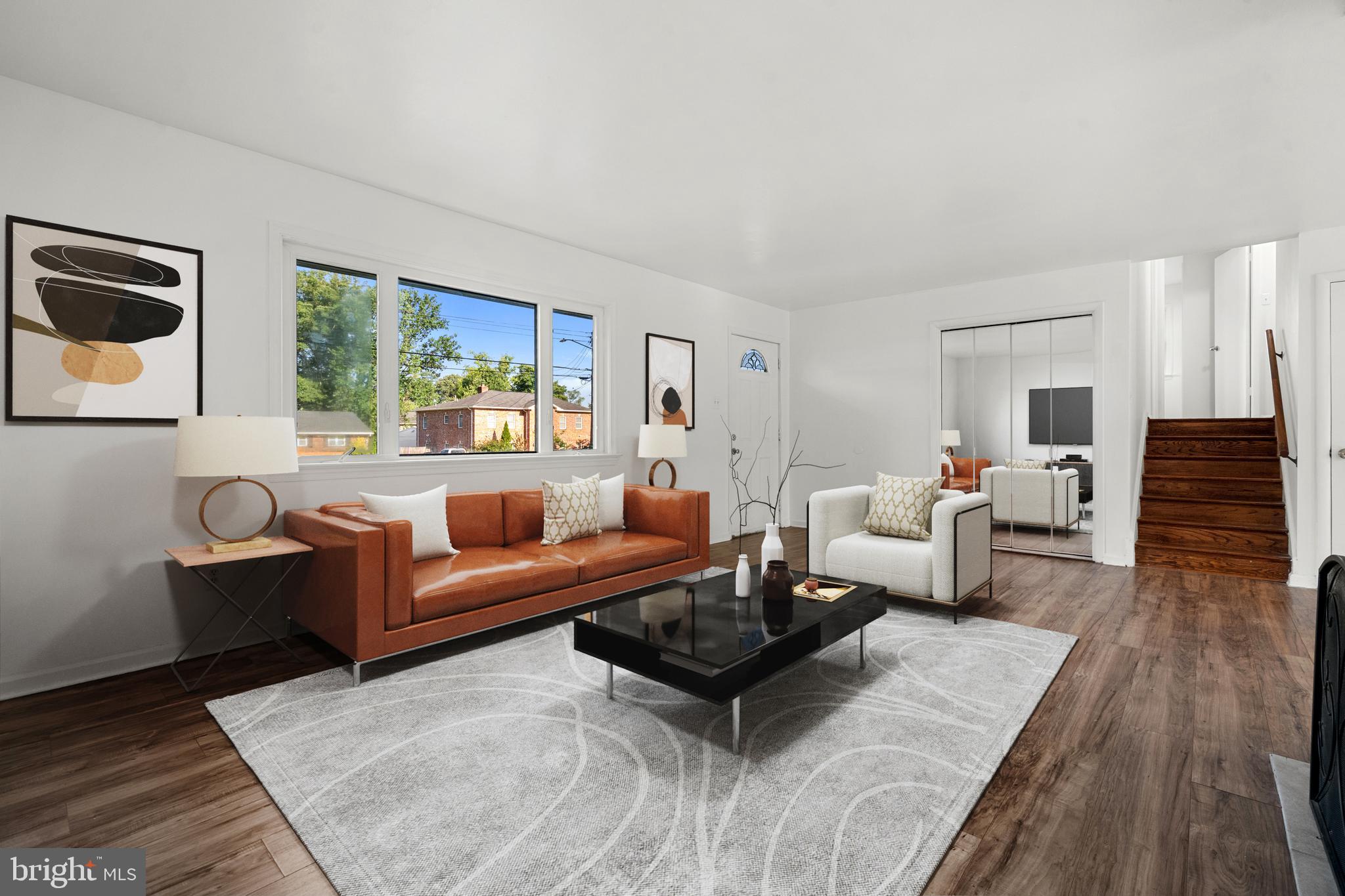 5505 Heming Avenue Springfield, VA 22151 - Photo 8 of 37 a living room with furniture rug and wooden floor
