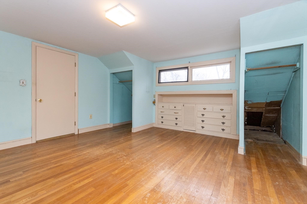 168 Richdale Road Needham, MA 02494 - Photo 13 of 18 wooden floor and window in an empty room