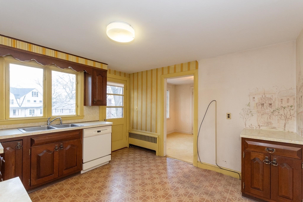 168 Richdale Road Needham, MA 02494 - Photo 5 of 18 a view of a kitchen counter space and windows