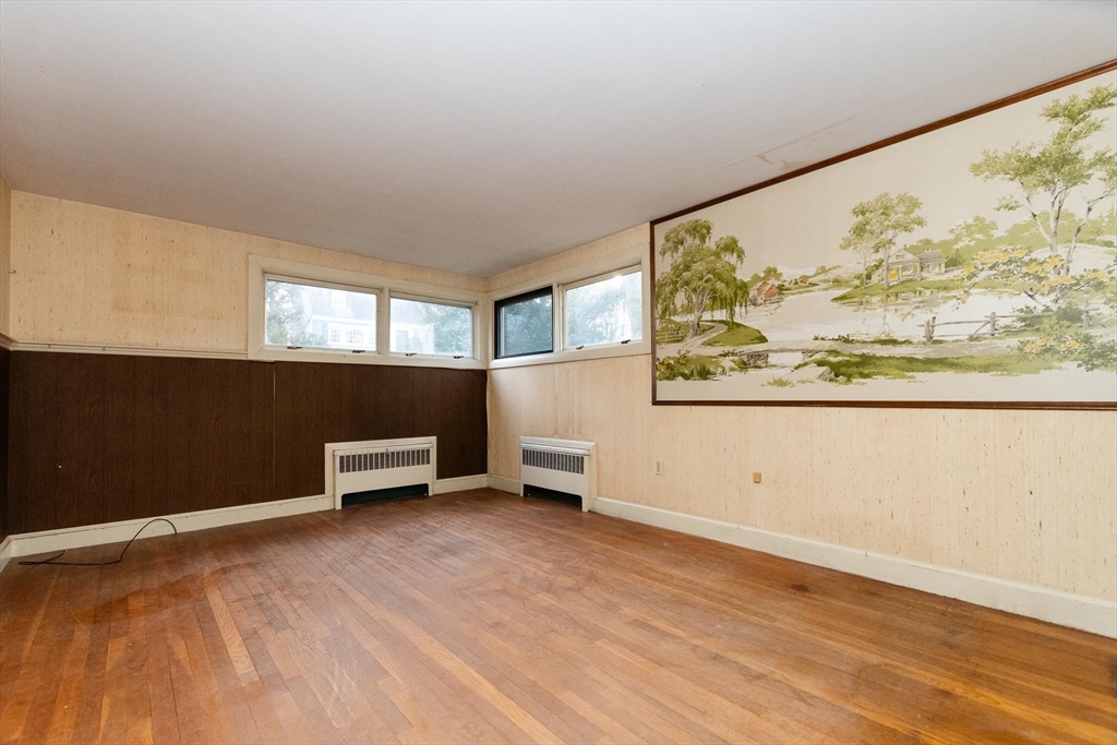 168 Richdale Road Needham, MA 02494 - Photo 9 of 18 a view of an empty room with a window