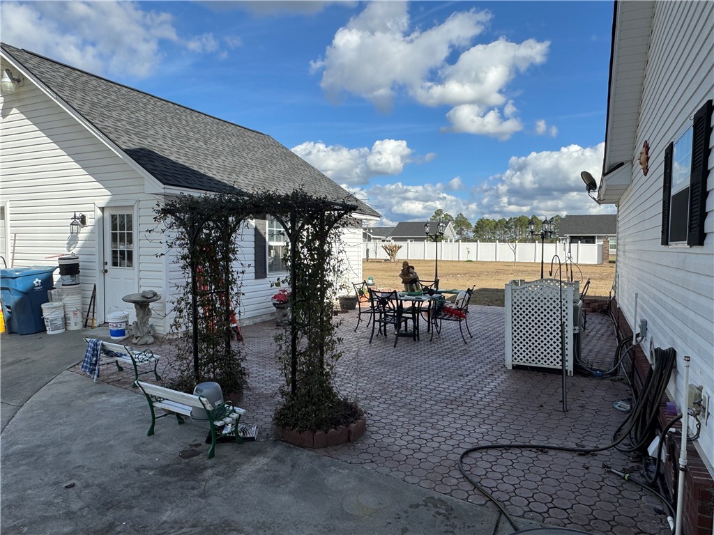 5710 Wooddell Ridge Road Waycross, GA 31503 - Photo 23 of 35 Court yard, trellis view