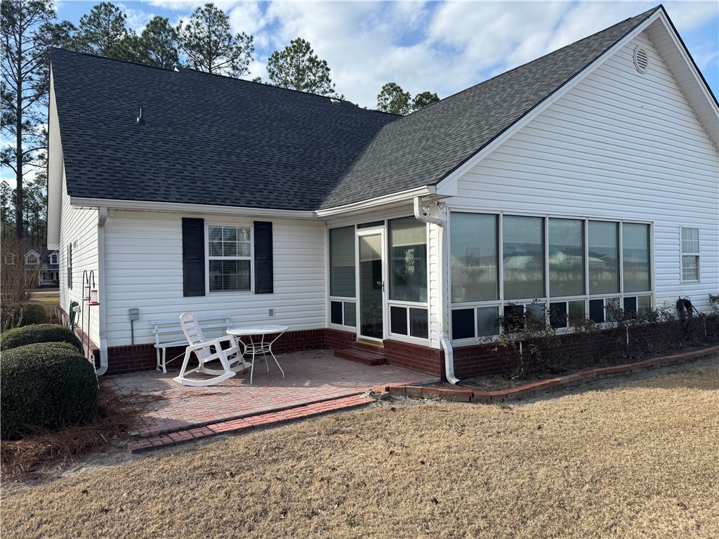 5710 Wooddell Ridge Road Waycross, GA 31503 - Photo 33 of 35 sunroom patio